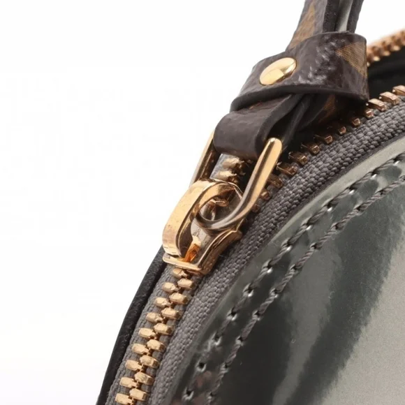 Authentic Louis Vuitton Vernis Alma - Picture 3 of 10